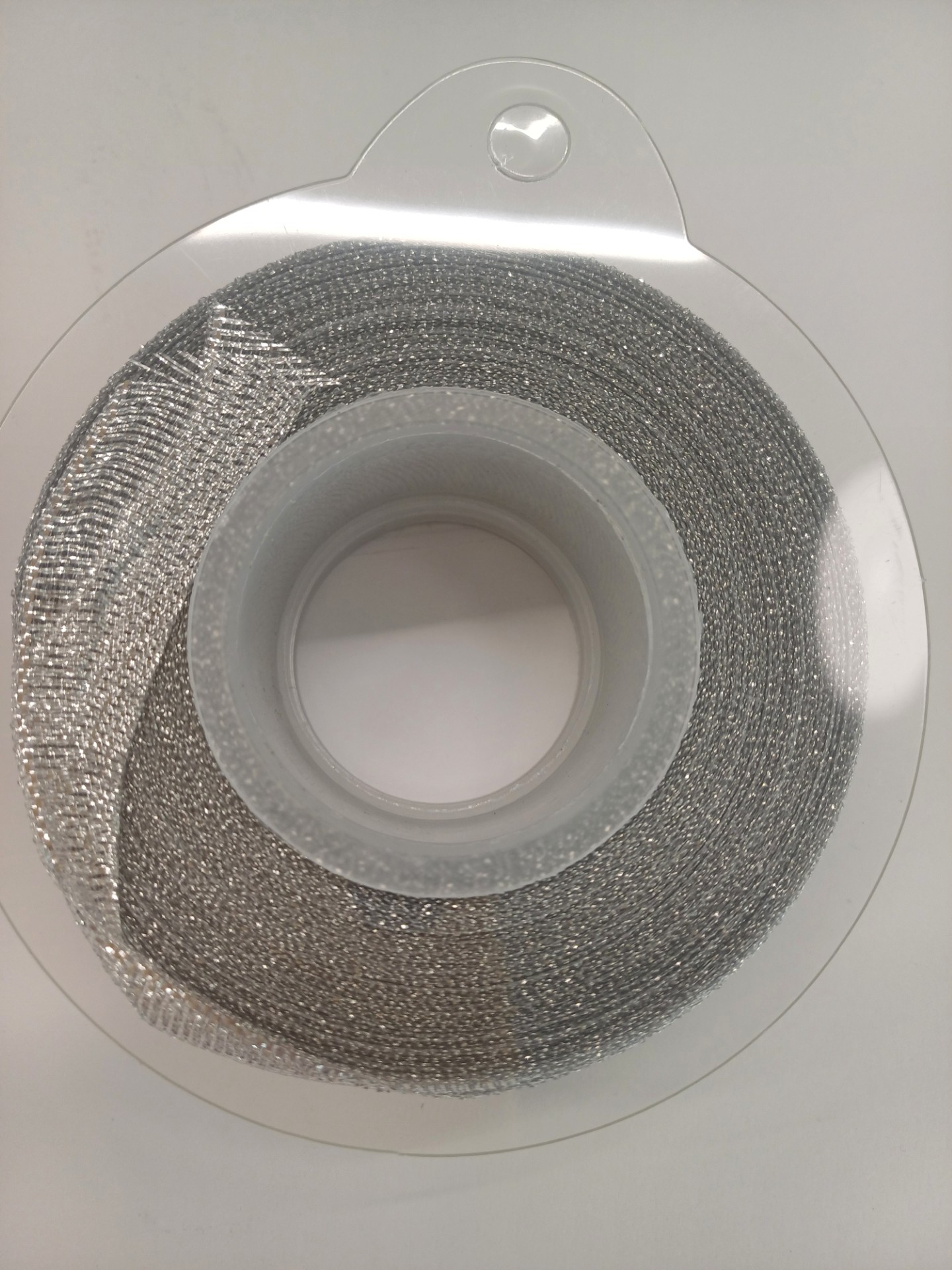 Ruban décoratif argenté 20mt x 2.5cm