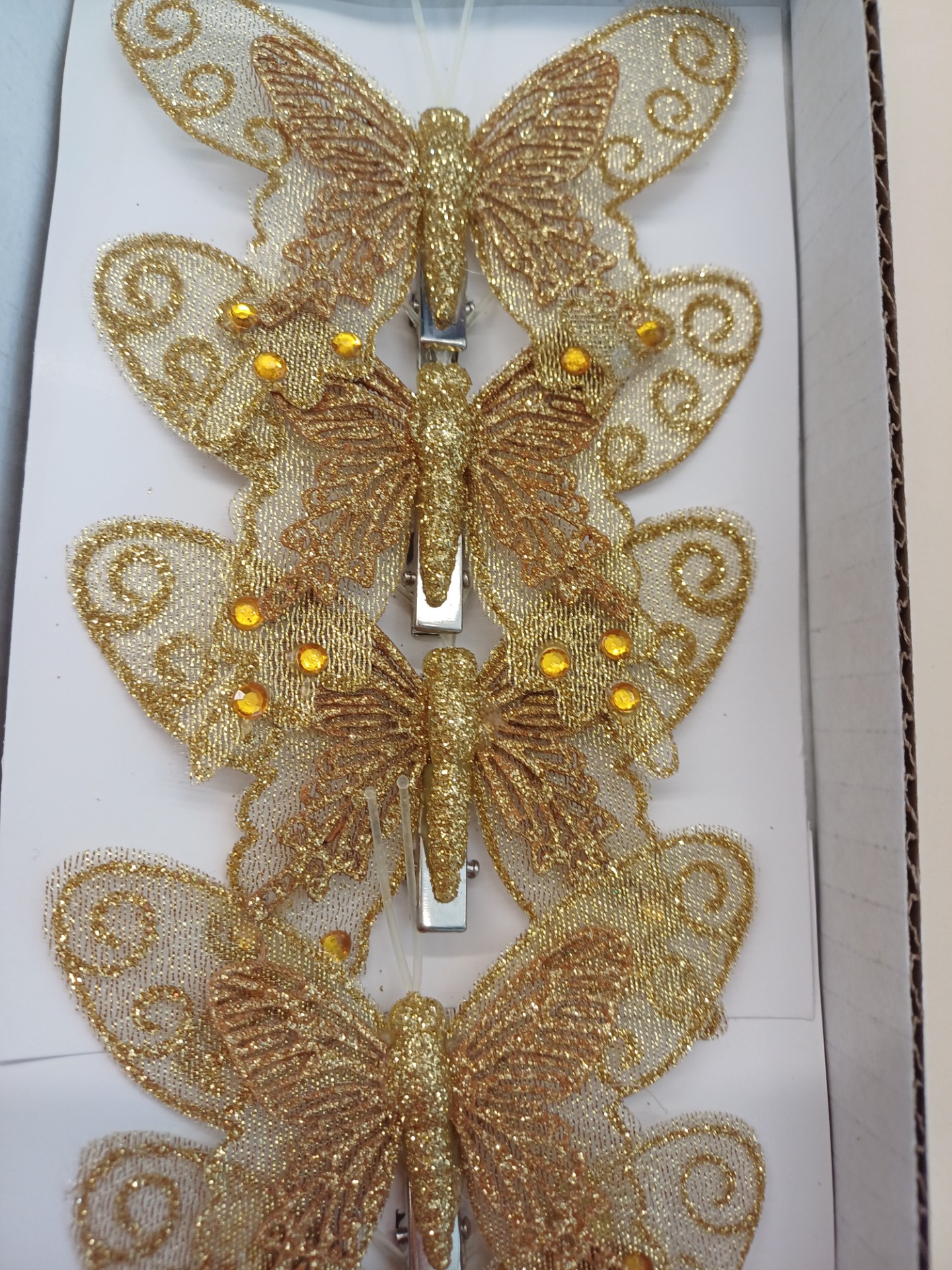 Papillon doré avec ressort 8cm boîte 6
